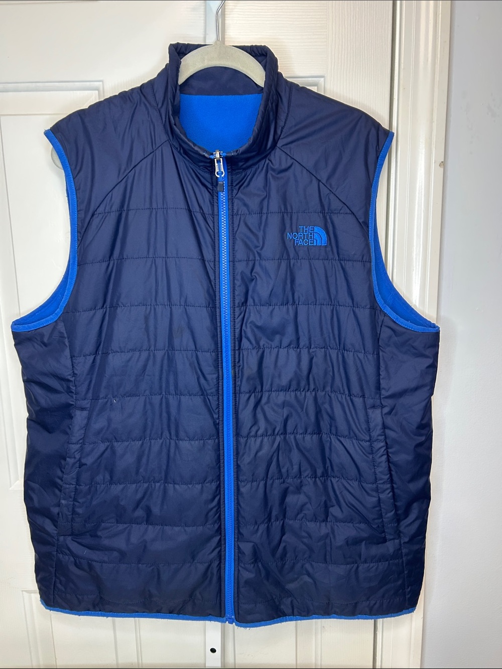 The North Face Mens Reversible
Insulated Quilted Vest Navy Blue Sz
XLT Fleece